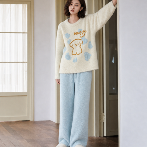 Woman wearing puppy print half fleece pajamas, cozy home lifestyle scene