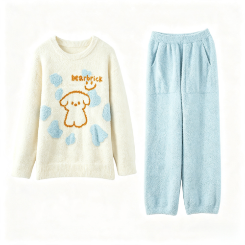 Flat lay of puppy print half fleece pajama set, top and pants on white background