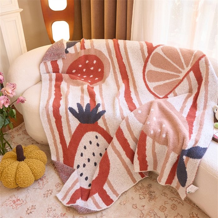 Jacquard Knitted Half Fleece Throw Blanket, Off-white Base with Red Stripe & Fruit Pattern, Draped View