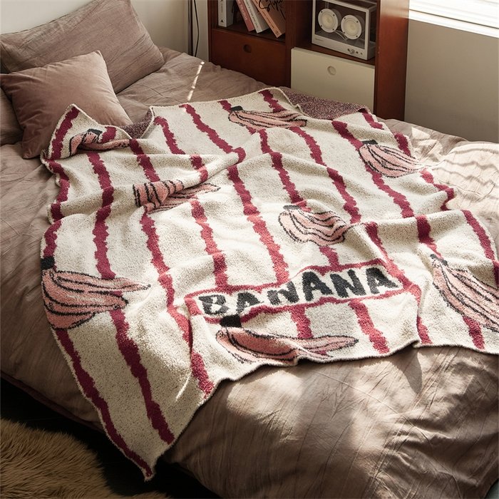 Jacquard Knitted Half Fleece Throw Blanket, Off-white Base with Burgundy Vertical Stripes & Pink Banana Pattern, Full Flat Front View