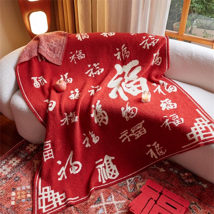 Jacquard Knitted Half Fleece Throw Blanket, Red Base with Off-white Chinese Fu Character Pattern, Draped View