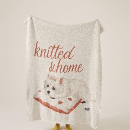 Off-white Half Fleece Knitted Throw Blanket with Cartoon Dog and Text Pattern, Angled Draped View