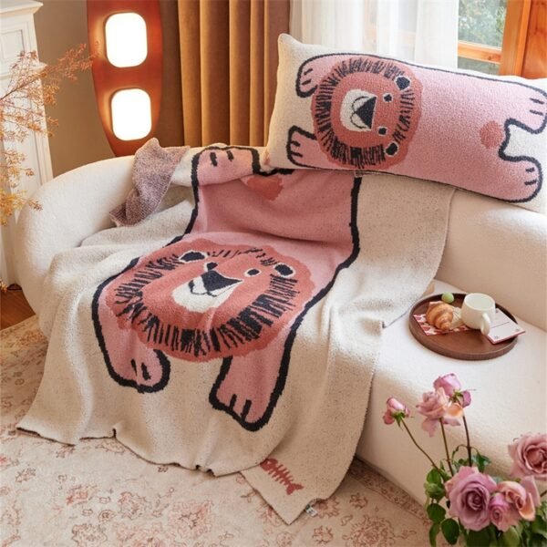 Jacquard Knitted Half Fleece Throw Blanket with Matching Long Pillow, Oatmeal Base with Pink Cartoon Lion Pattern, Draped View