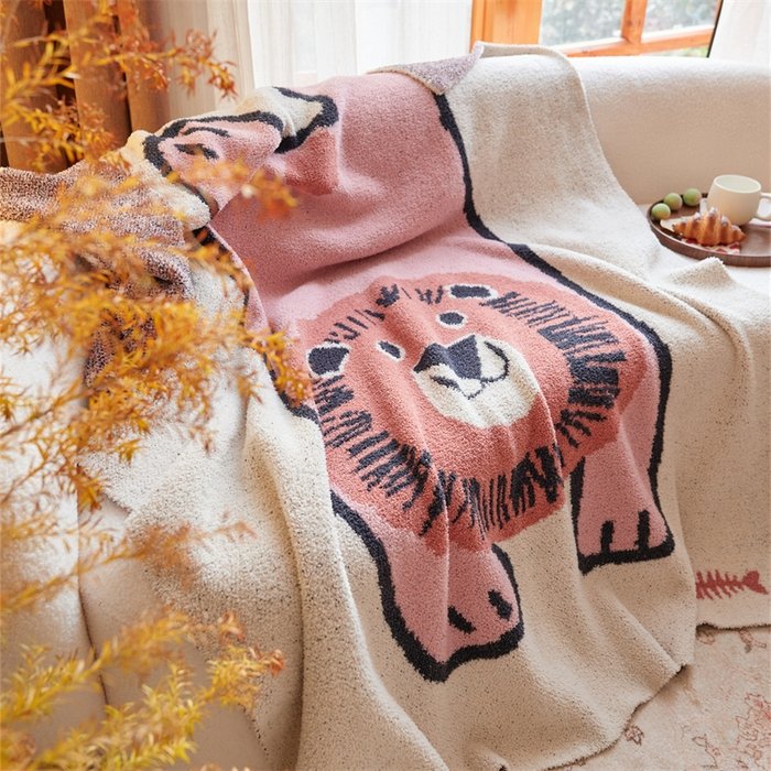 Jacquard Half Fleece Throw Blanket, Oatmeal Base with Pink Cartoon Lion Pattern, Close-up Draped View