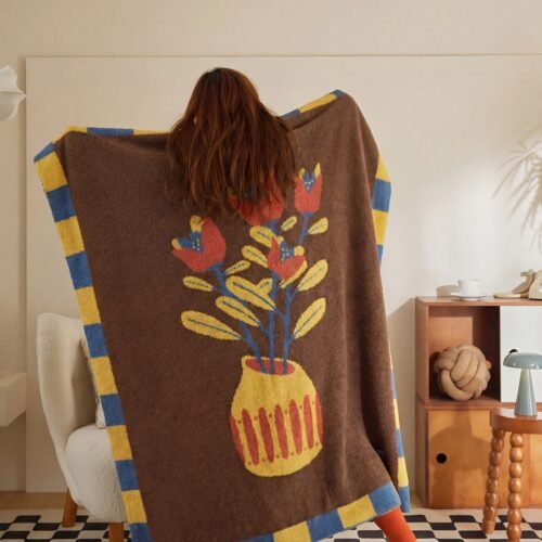 Brown Half Fleece Knitted Throw Blanket with Floral Vase Pattern and Checkered Border, Full Hanging View