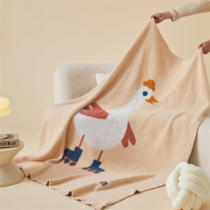 Apricot Half Fleece Knitted Throw Blanket with Roller Skating Goose Pattern, Hanging Draped View