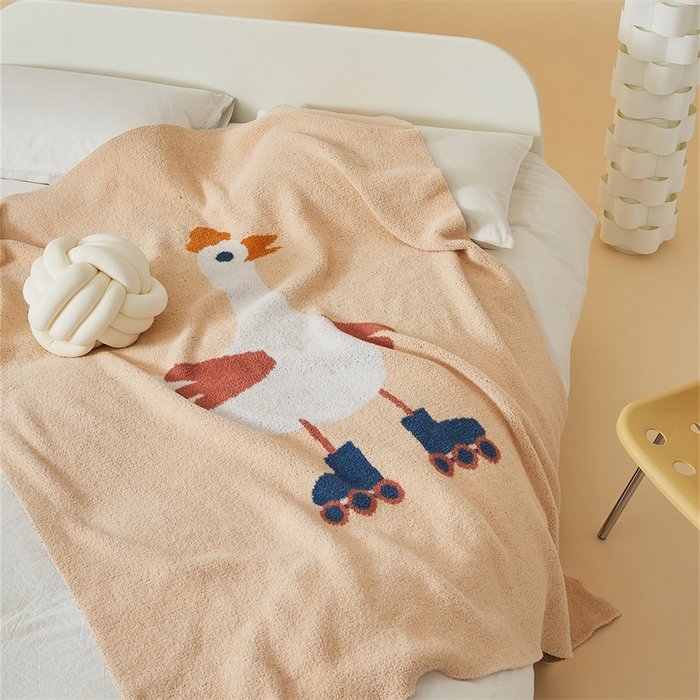 Apricot Half Fleece Knitted Throw Blanket with Roller Skating Goose Pattern, Spread Draped View