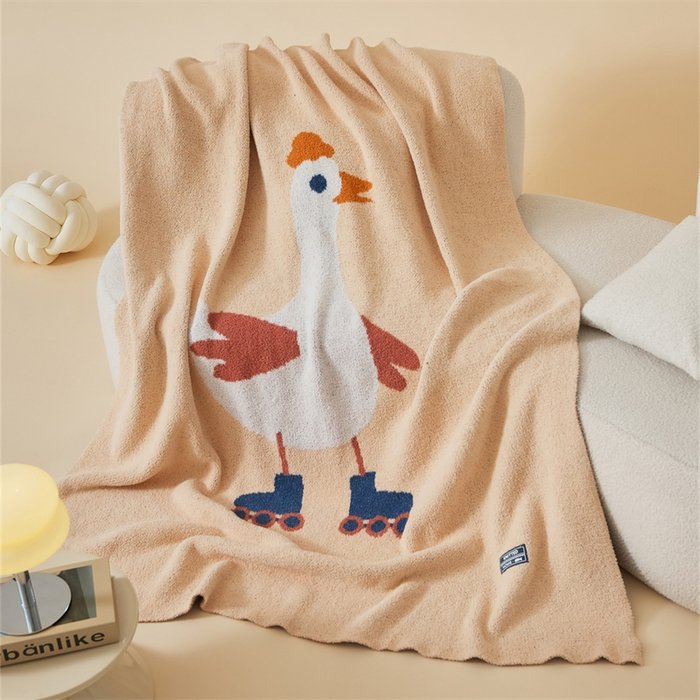 Flat Lay Apricot Half Fleece Knitted Throw Blanket with Roller Skating Goose Pattern