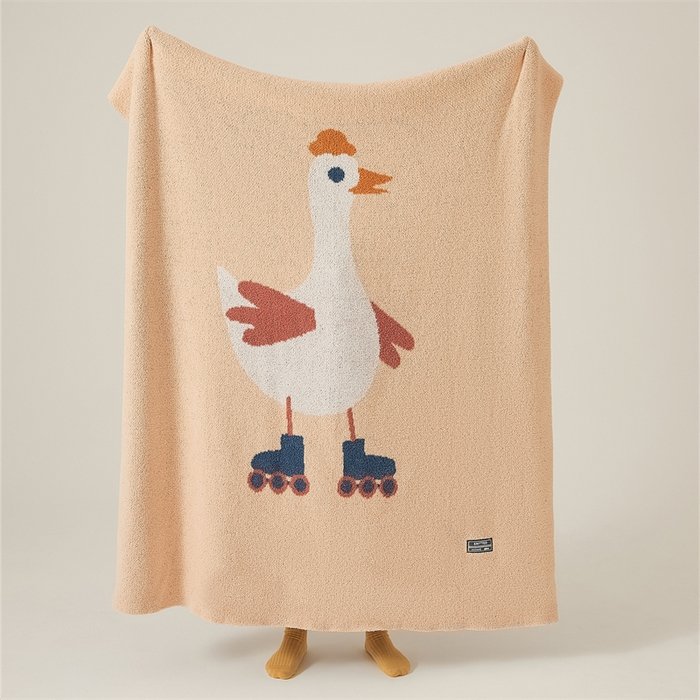Apricot Half Fleece Knitted Throw Blanket with Roller Skating Goose Pattern, Side Draped View