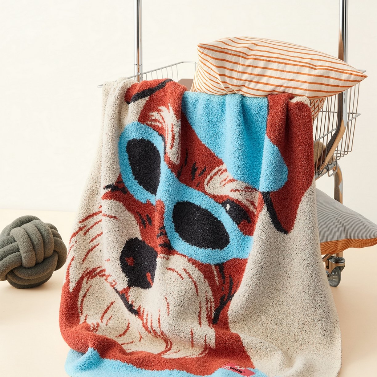 Folded Beige Half Fleece Knitted Throw Blanket with Cartoon Dog Pattern