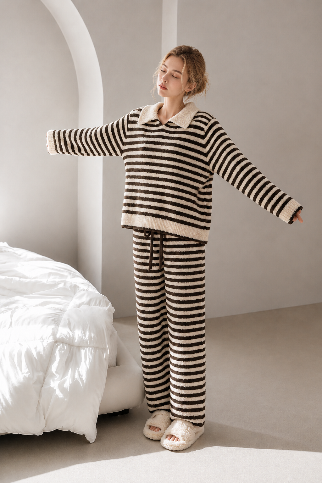 Dark brown and cream striped plush fleece pajama set with a relaxed collared pullover, cream ribbed trim and matching striped pants.