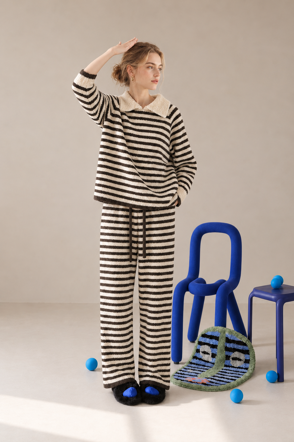 Dark brown and cream striped plush fleece pajama set with a long-sleeve collared pullover, ribbed trim and matching striped drawstring pants.