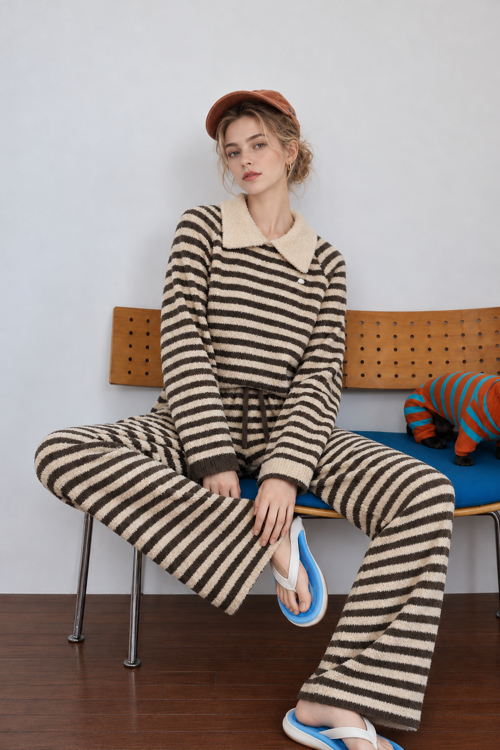 Dark brown and cream striped plush fleece two-piece pajama set with a cream turn-down collar, ribbed sleeve cuffs and matching drawstring pants.