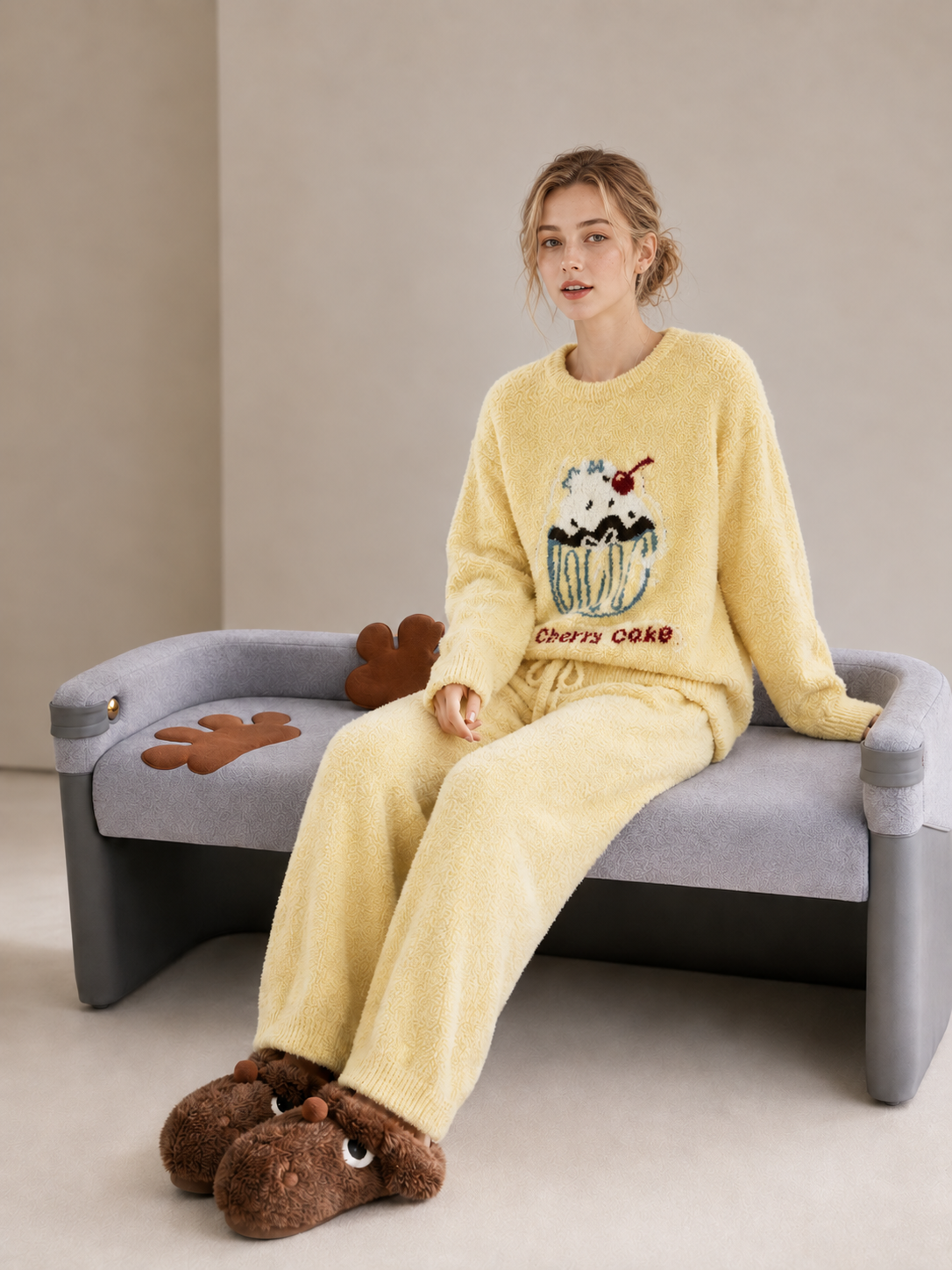 Women's Pale Yellow Half Fleece Pajama Set Flat Lay, Crew Neck Long Sleeve Top with Cherry Cupcake & "Cherry Cake" Lettering, Drawstring Waist Jogger Pants with Side Pockets, Ribbed Cuffs & Hem