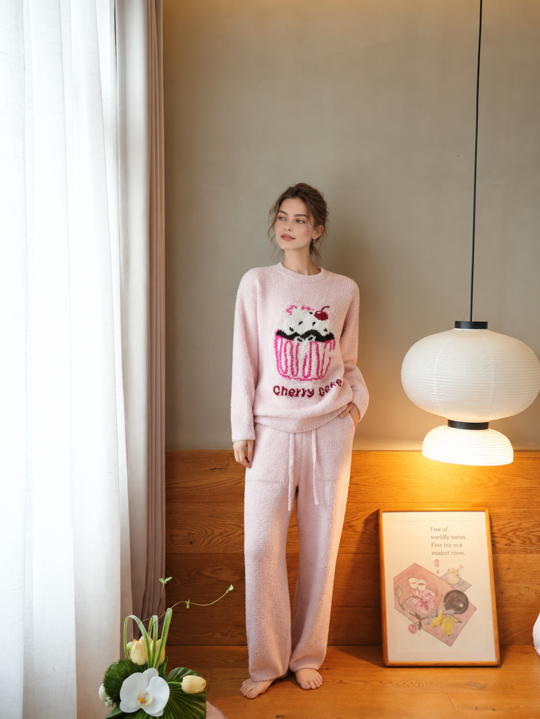 Women's Pink Half Fleece Pajama Set Flat Lay, Crew Neck Long Sleeve Top with Cherry Cupcake & "Cherry Cake" Lettering, Drawstring Waist Wide Leg Pants with Side Pockets, Ribbed Cuffs & Hem